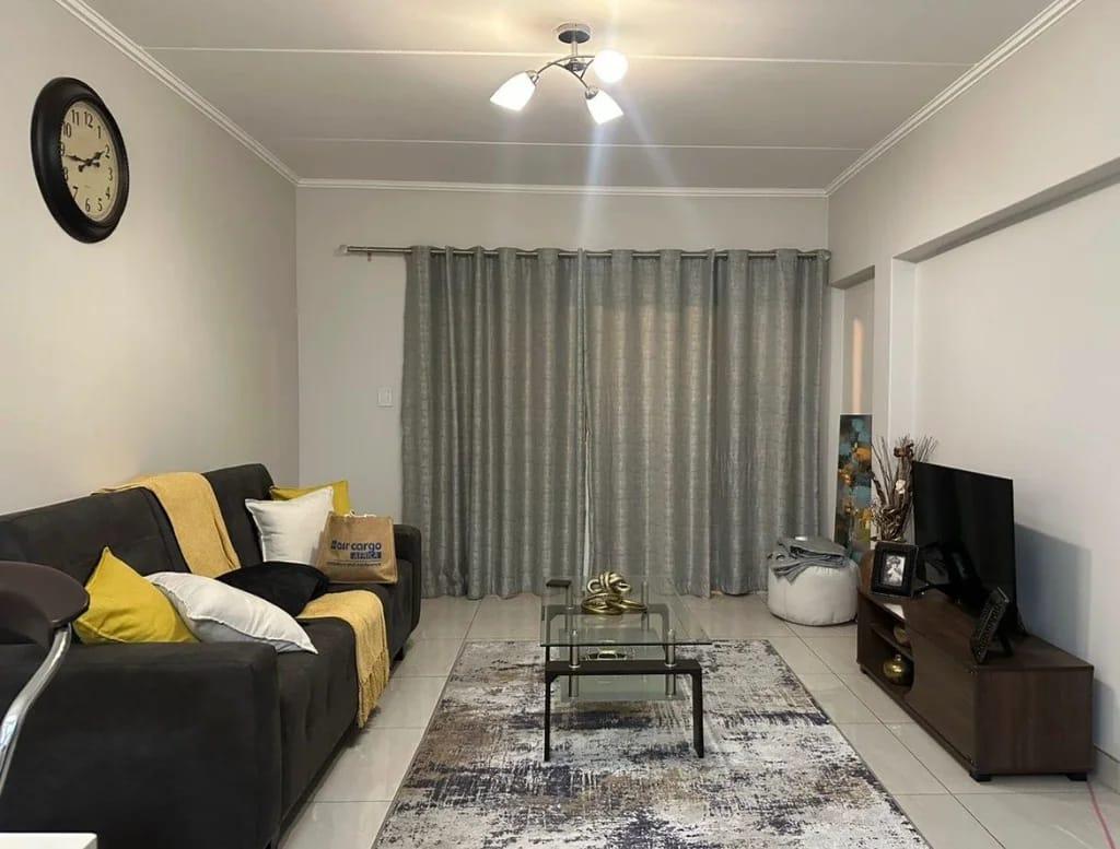 A stunning 3 bed 2 bath ground floor apartment with 2 covered parking