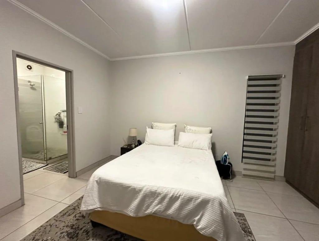 A stunning 3 bed 2 bath ground floor apartment with 2 covered parking