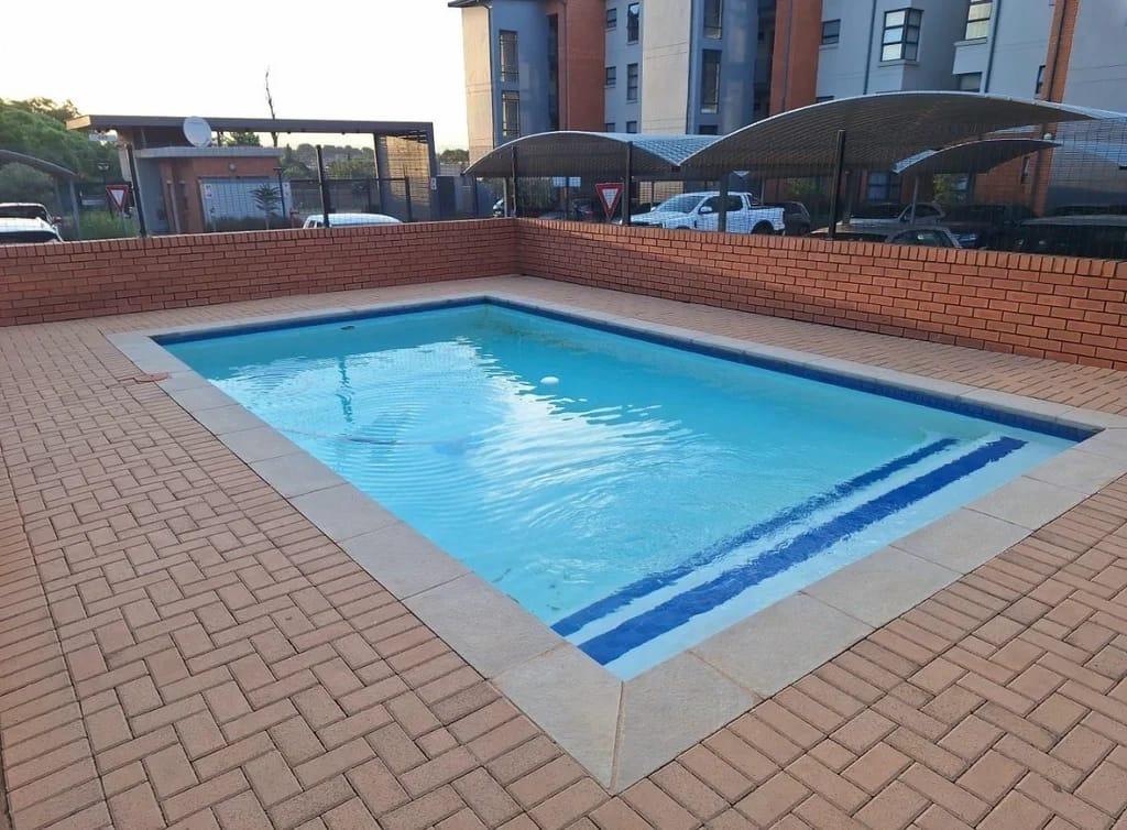 A stunning 3 bed 2 bath ground floor apartment with 2 covered parking