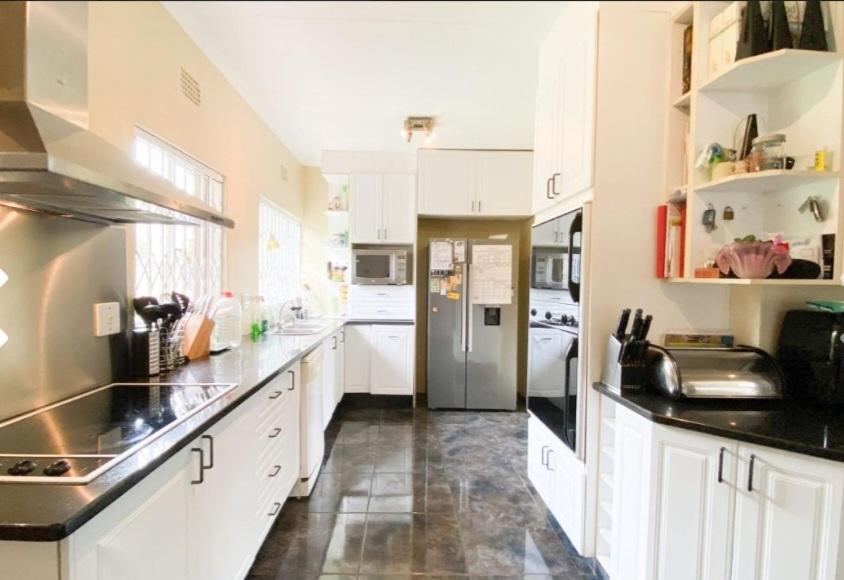 Large family home for sale in boomed off and secure Eden glen