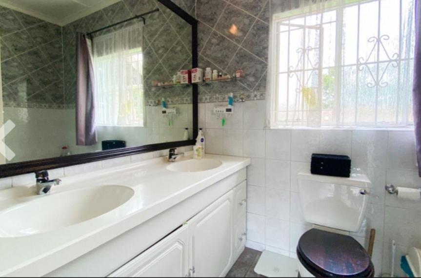 Large family home for sale in boomed off and secure Eden glen